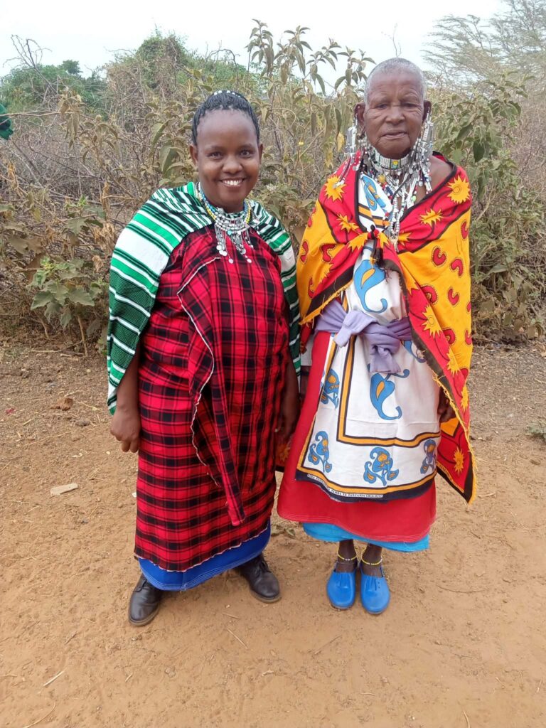 Rose Reisiato smiling warmly, reflecting her background in Human Resource Management and her resilient upbringing in a pastoralist home.